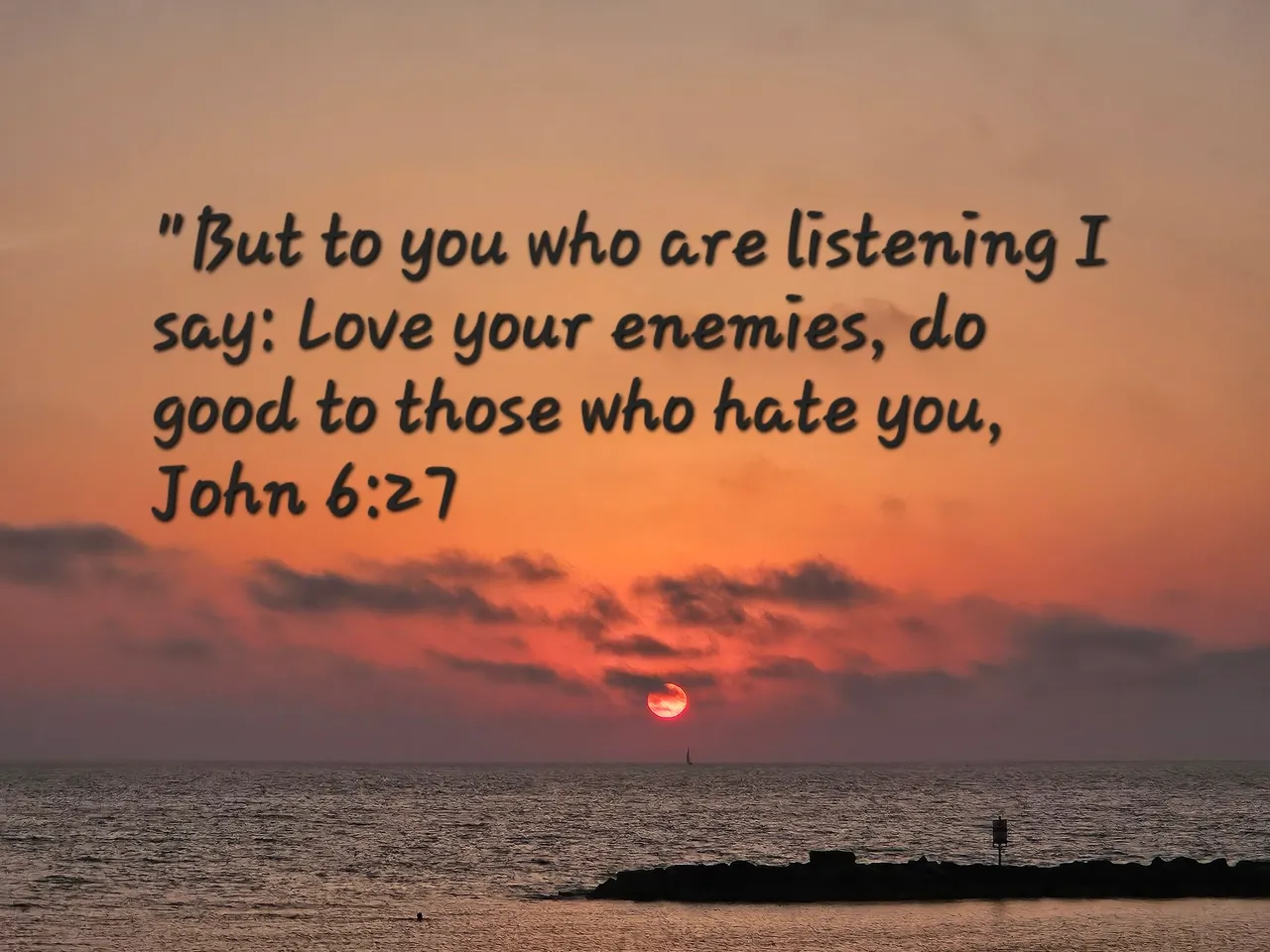 Bible verse over ocean sunset
