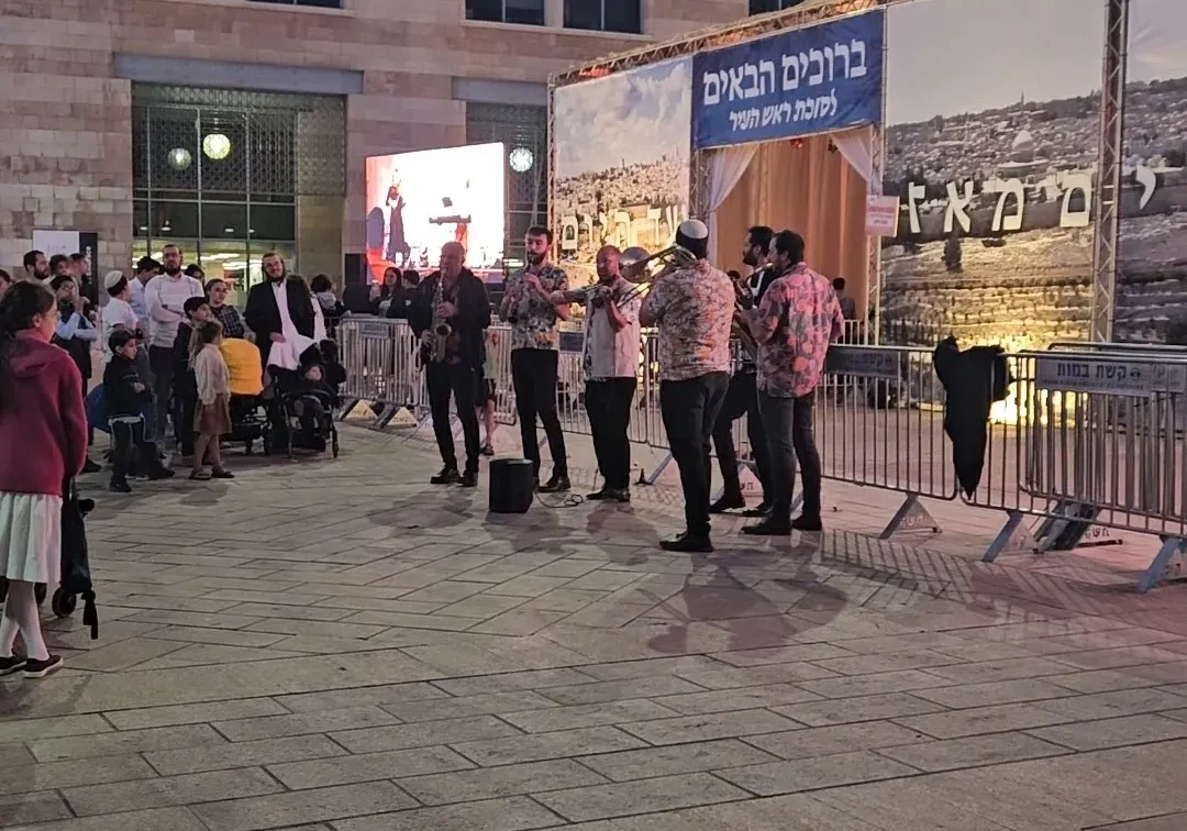 Crowd outside modern architectural structure